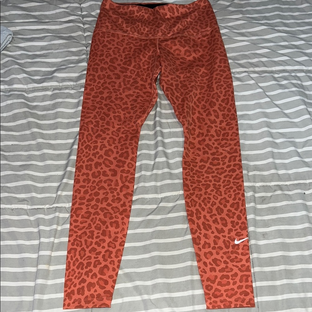 Nike Women's Orange Leopard Print Leggings
